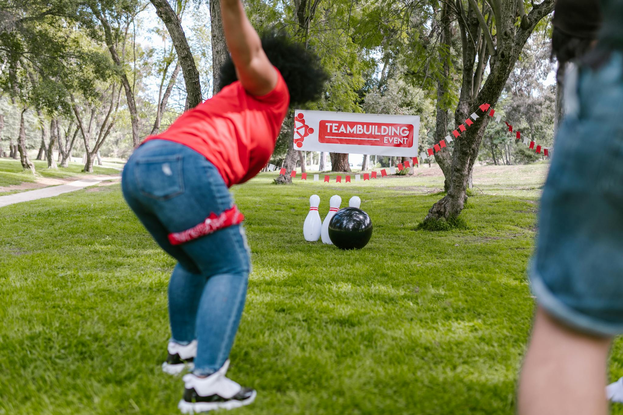 Fun outdoor team building event featuring an exciting bowling game, fostering unity and teamwork.